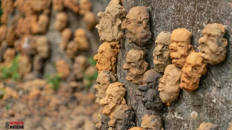 Place to See - Memorial faces made by visitors