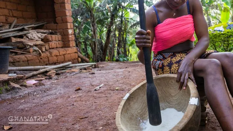 Ghanaians preparing traditional Fufu