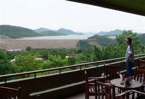 Place to See - A photo of Akosombo Dam, showing the dam's structure and the surrounding Lake Volta.