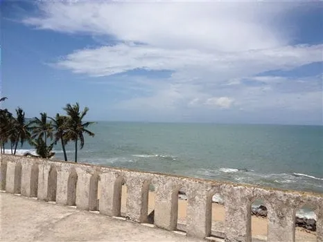 Destinations - Overview of Elmina Castle and the sea