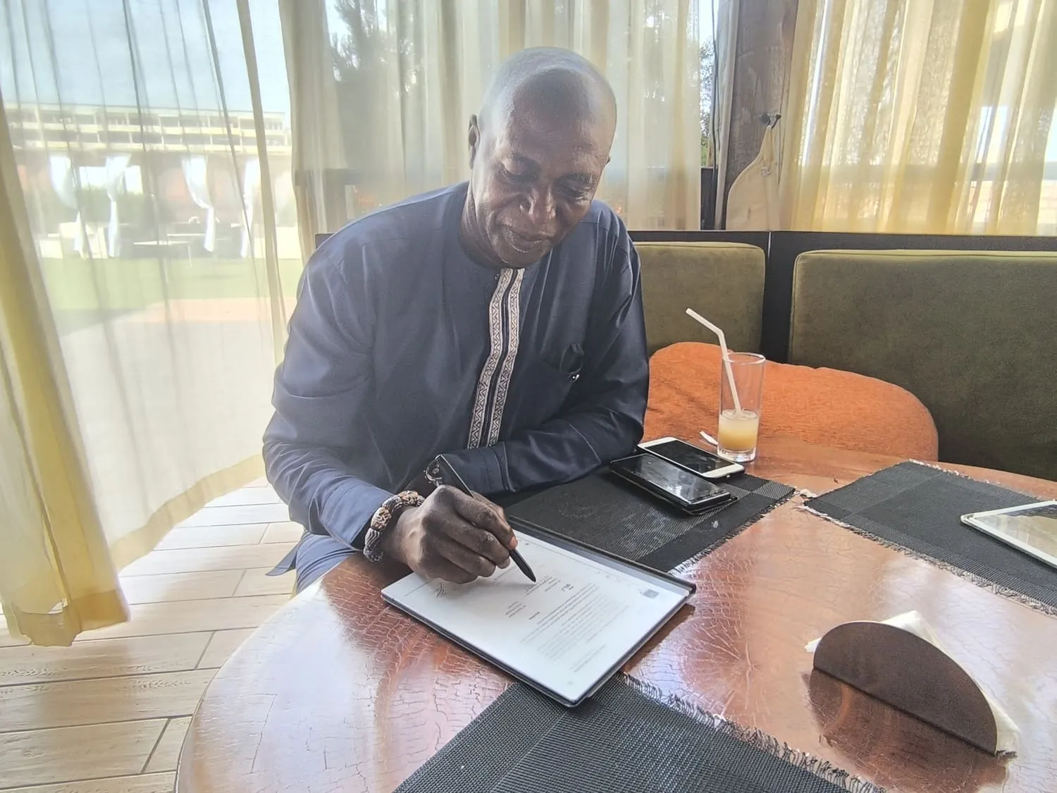 Mr. William Yeboah signs the MoU in his position as President of the ABQA.